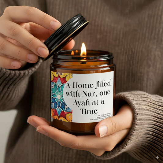 “A Home Filled With Nur, One Ayah at a Time” Islamic soy candle in amber glass jar on a neutral décor tray