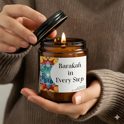 “Barakah in every step” Islamic soy candle in amber glass jar styled on a neutral décor tray
